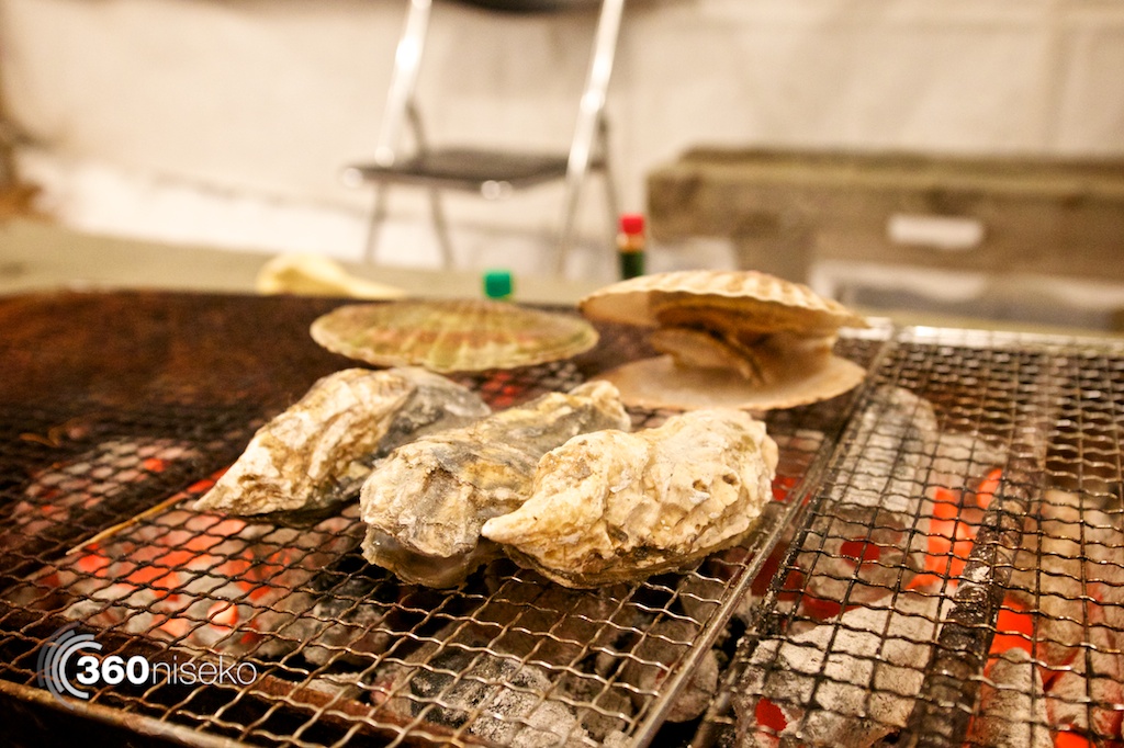 Amazing oysters from Nemuro in Eastern Hokkaido roasting on the charcoal BBQ