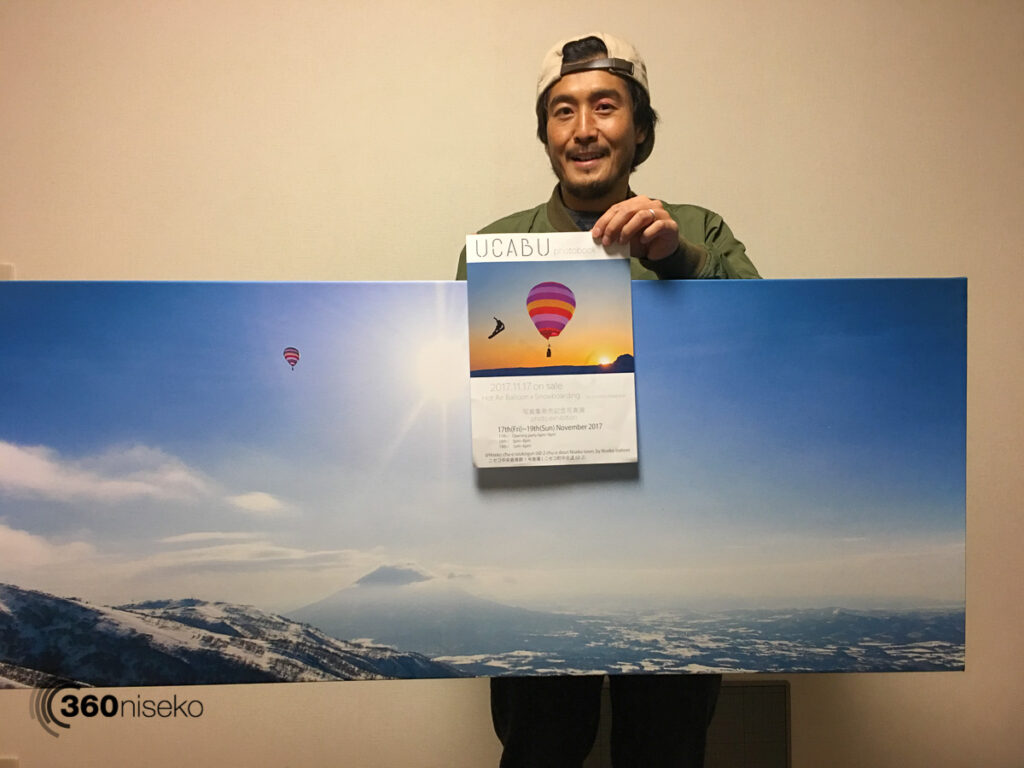 Jun picking up a canvas print for the exhibition, 16 November 2017